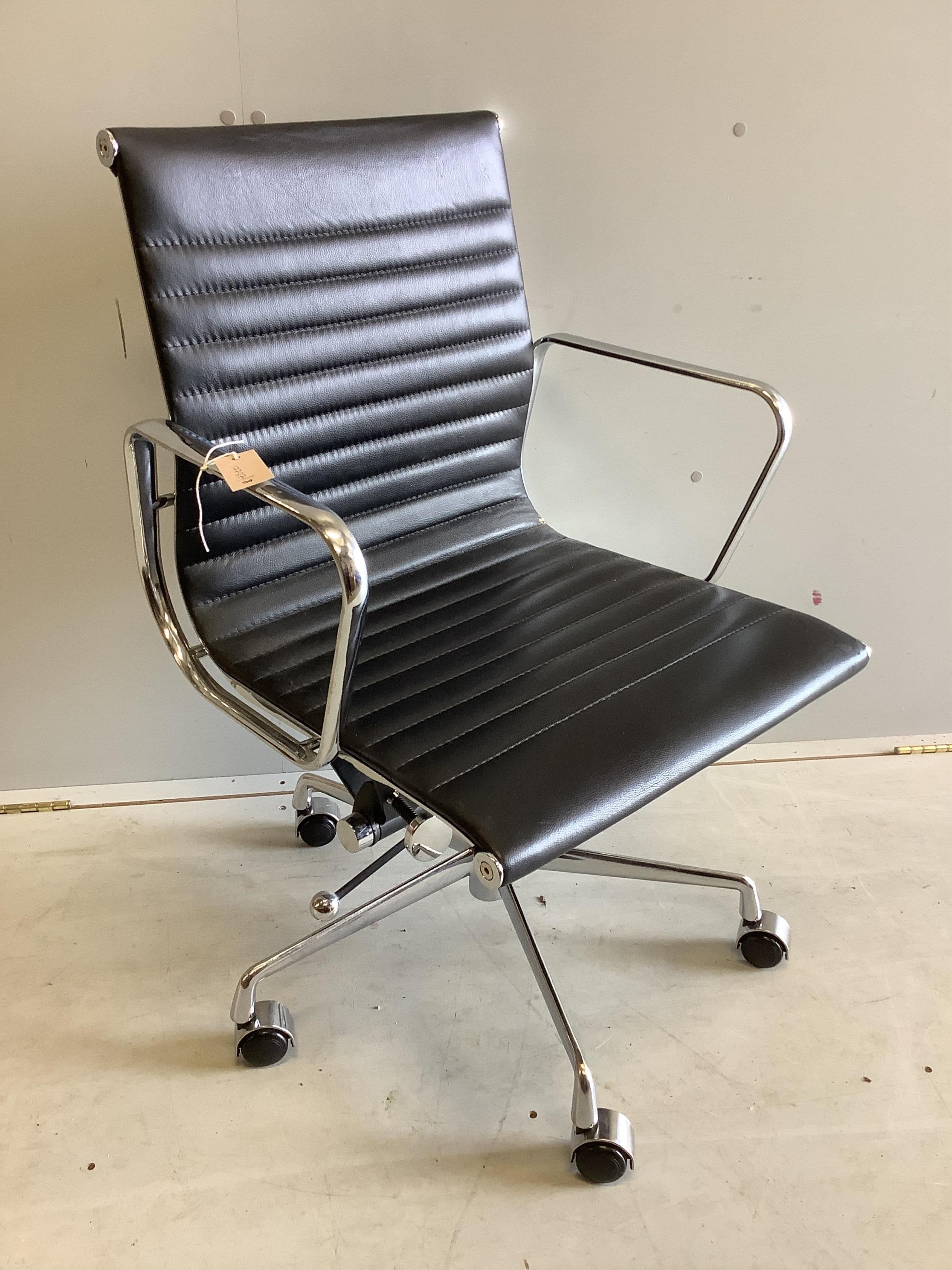 An Eames style desk chair, width 58cm, depth 50cm, height 90cm